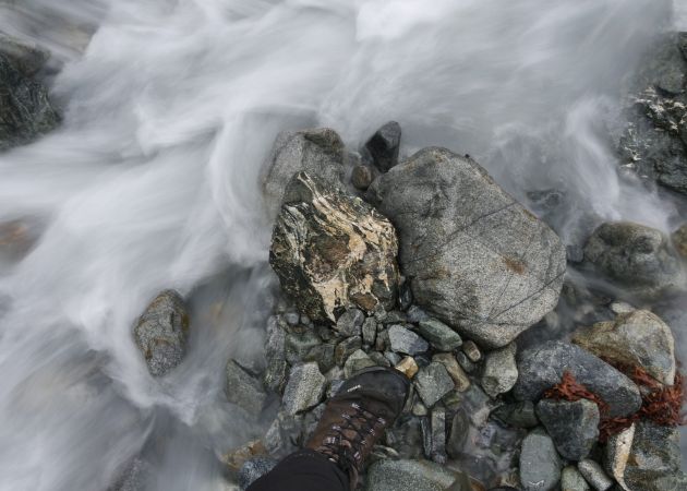 river flowing around a stone
